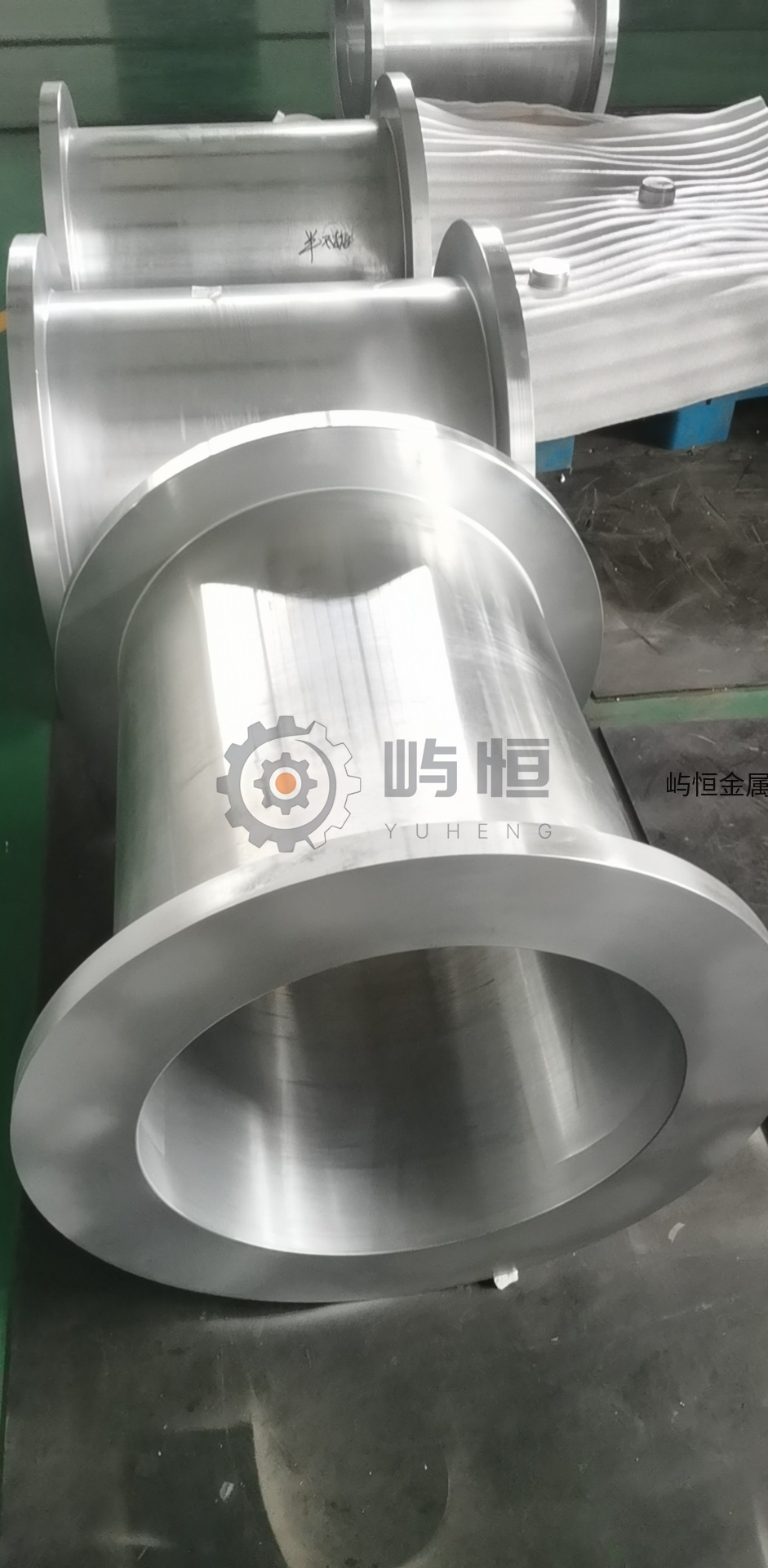 关于ZA303高强韧耐磨合金在回转窑托轮瓦上的研究及其应用